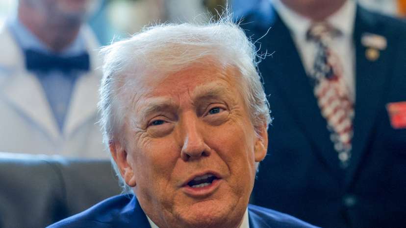 U.S. President Trump signs executive orders at the Oval Office, in Washington