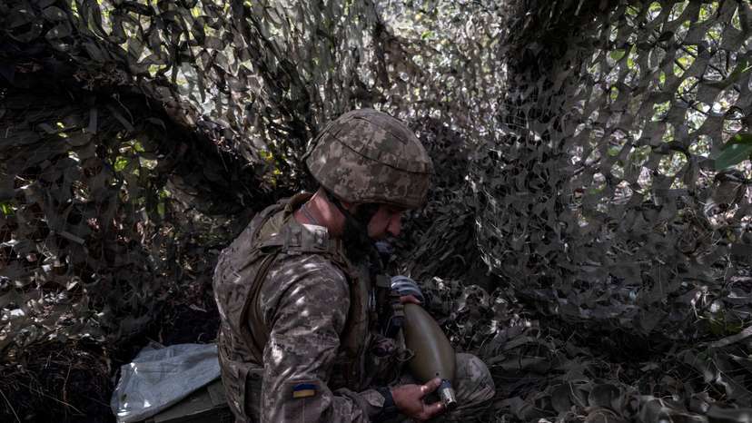 FILE PHOTO: Ukrainian service member prepares mortar shells before firing toward Russian troops near the frontline town of Kostiantynivka