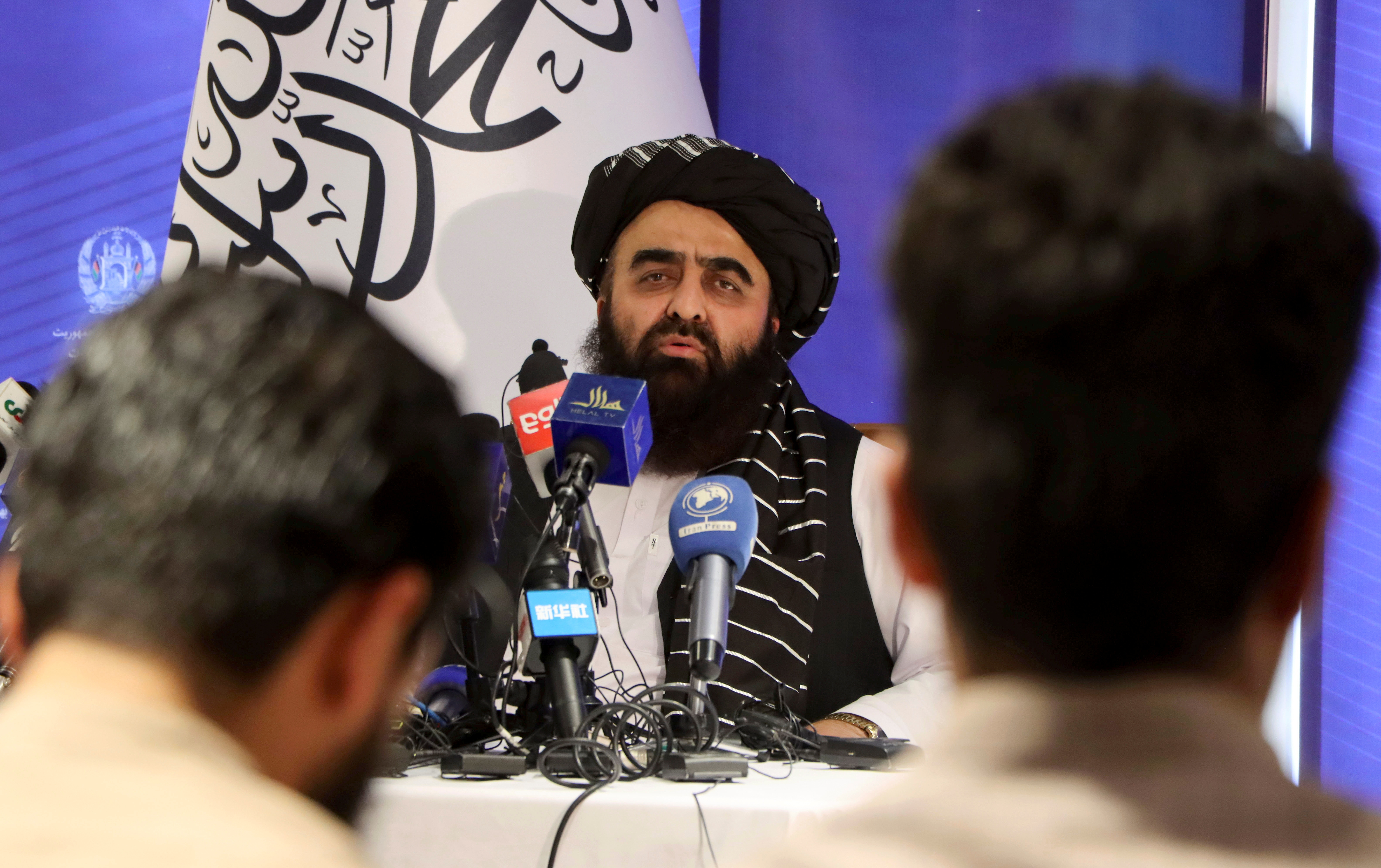 Taliban acting Foreign Minister Amir Khan Muttaqi speaks during a news conference in Kabul