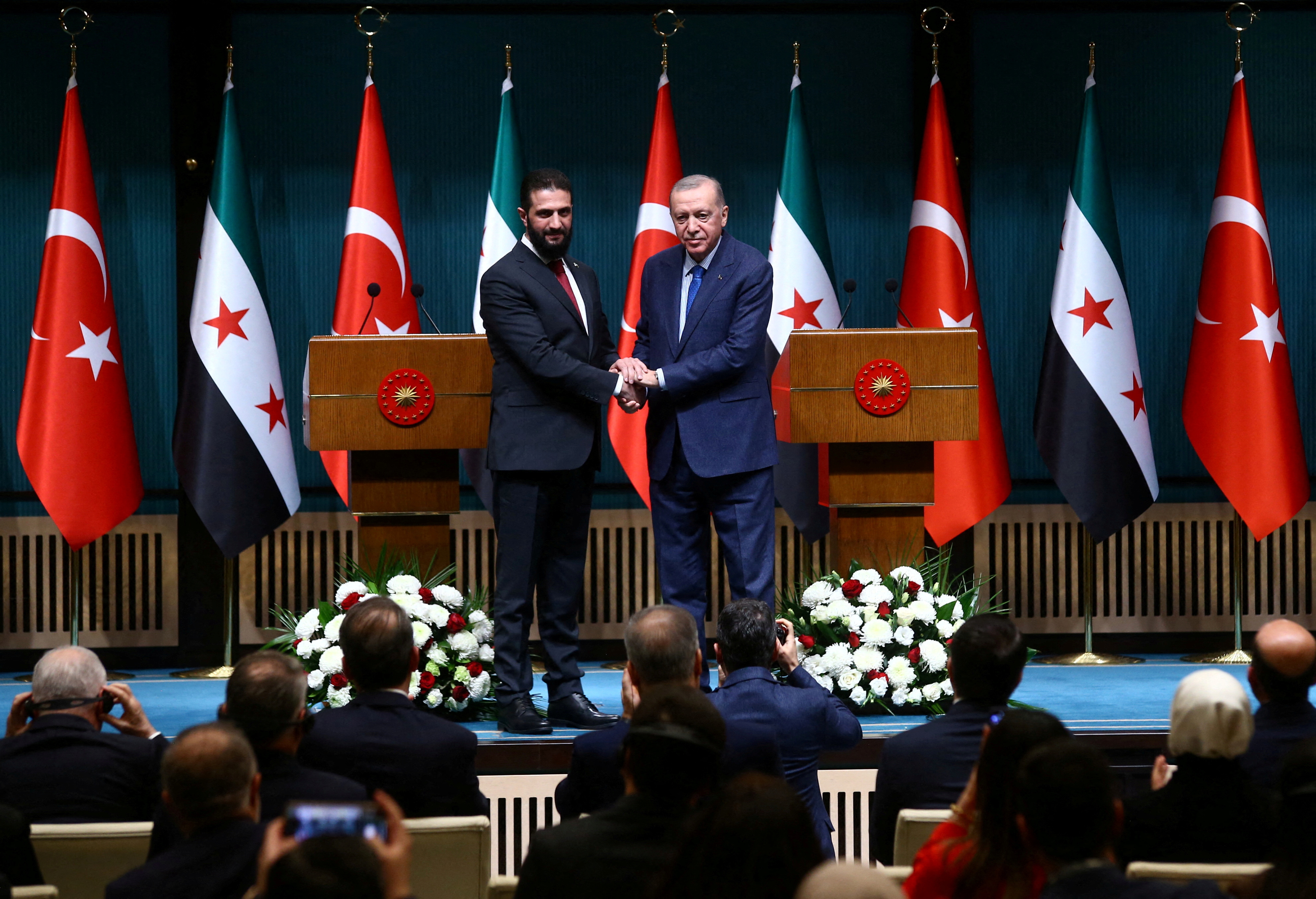FILE PHOTO: Syria's newly appointed president for a transitional phase Ahmed al-Sharaa visits Ankara