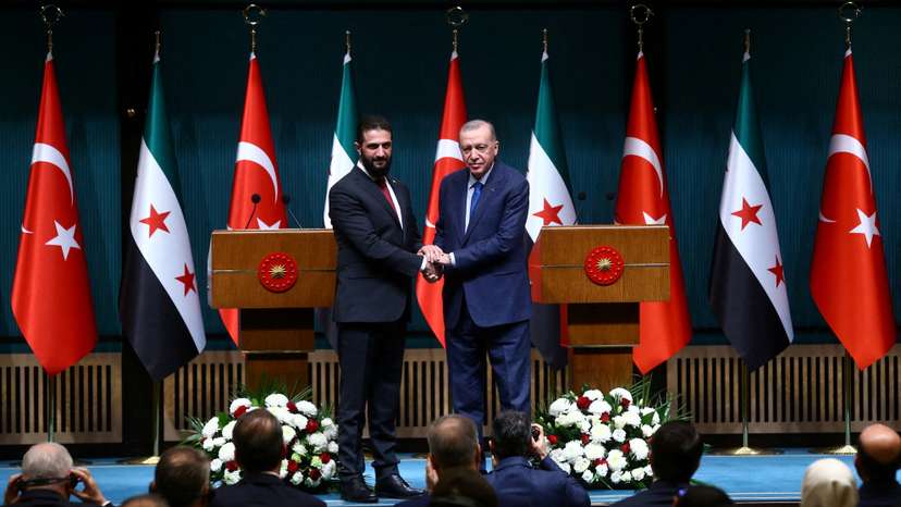 FILE PHOTO: Syria's newly appointed president for a transitional phase Ahmed al-Sharaa visits Ankara