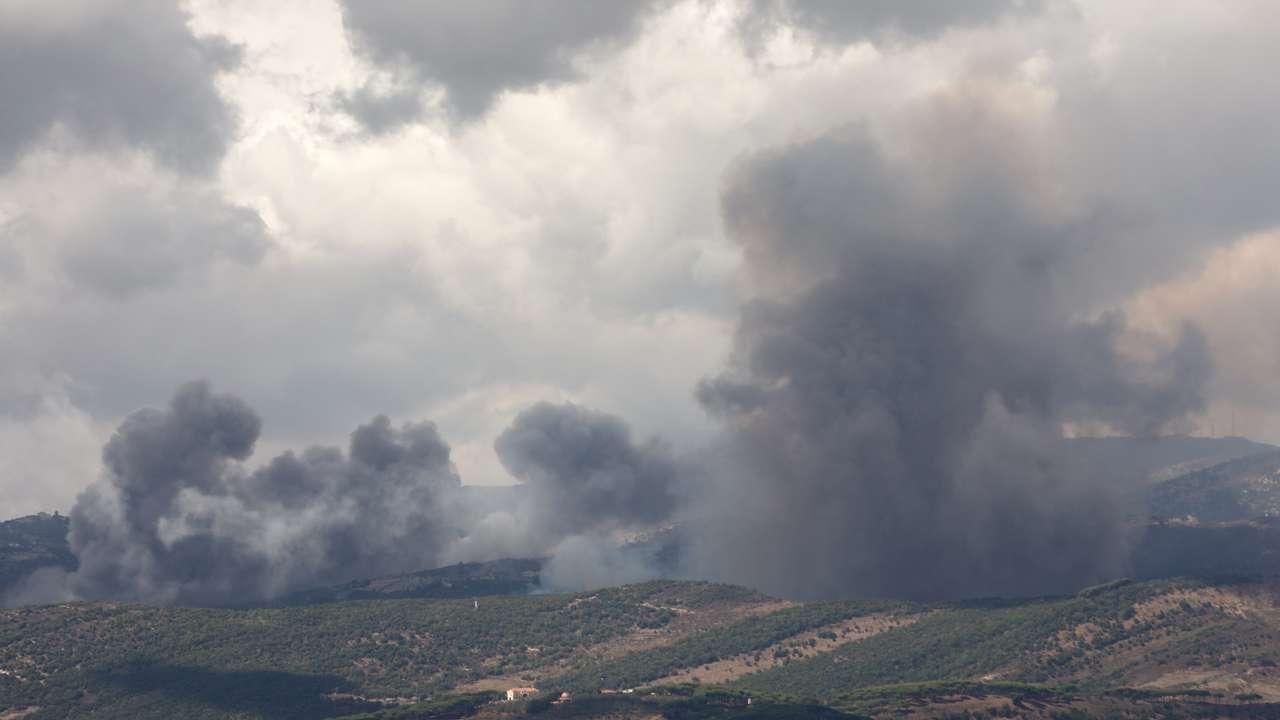 Smoke rises from Jabal al-Rihan as pictured from Marjayoun