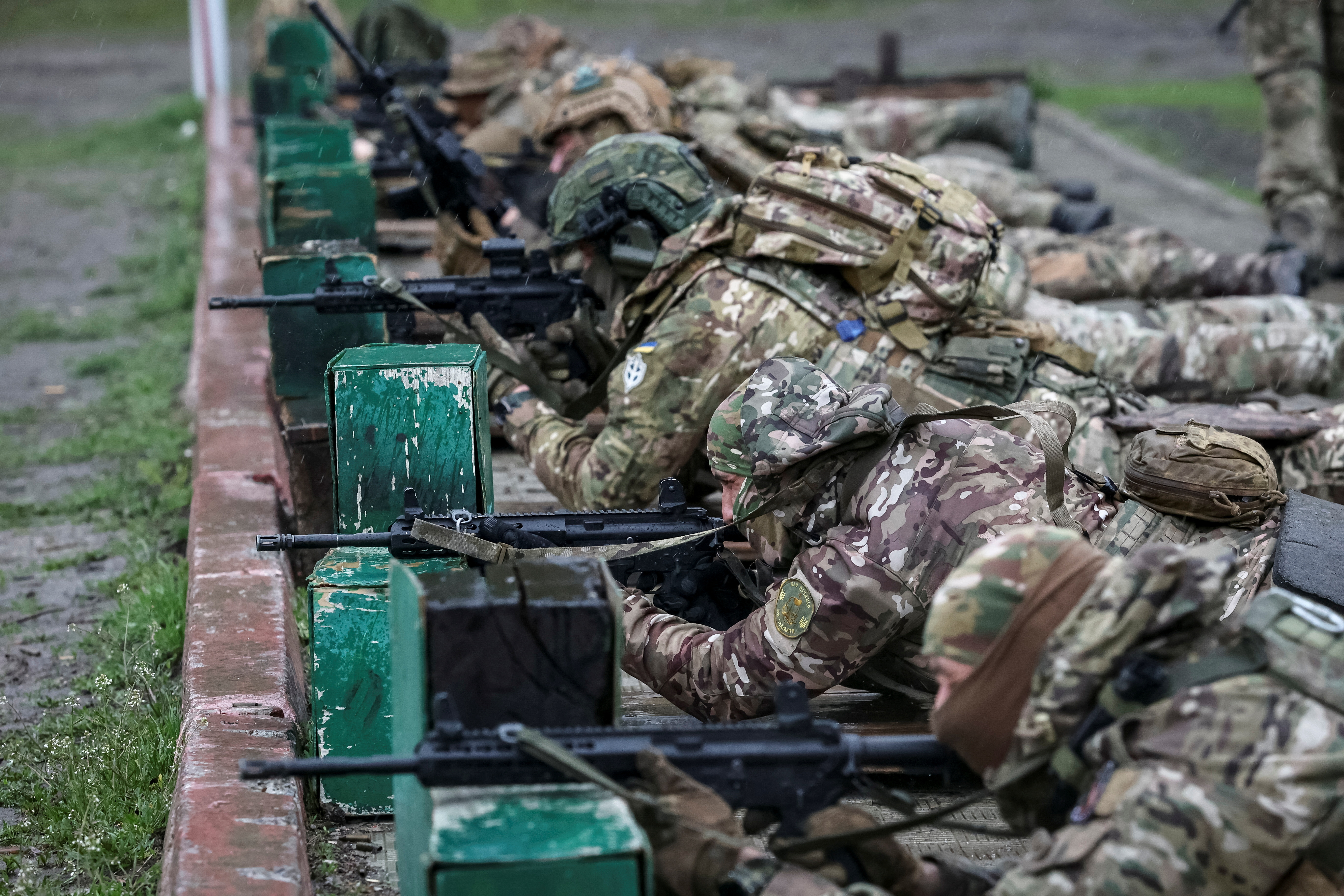 FILE PHOTO: Recruits of the Spartan storm brigade of the Ukrainian National Guard practise at the unit's base in Kharkiv region