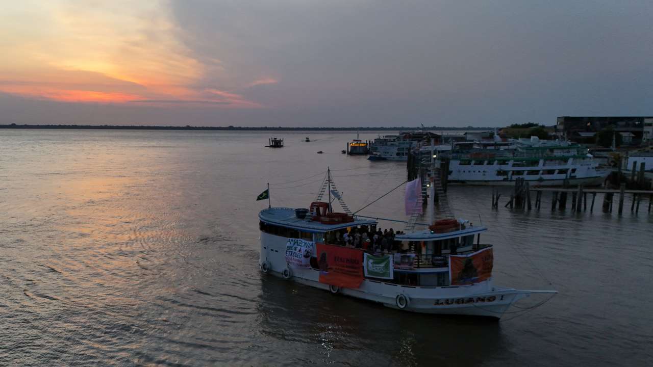 Indigenous flotilla arrives for COP30 climate summit, in Belem