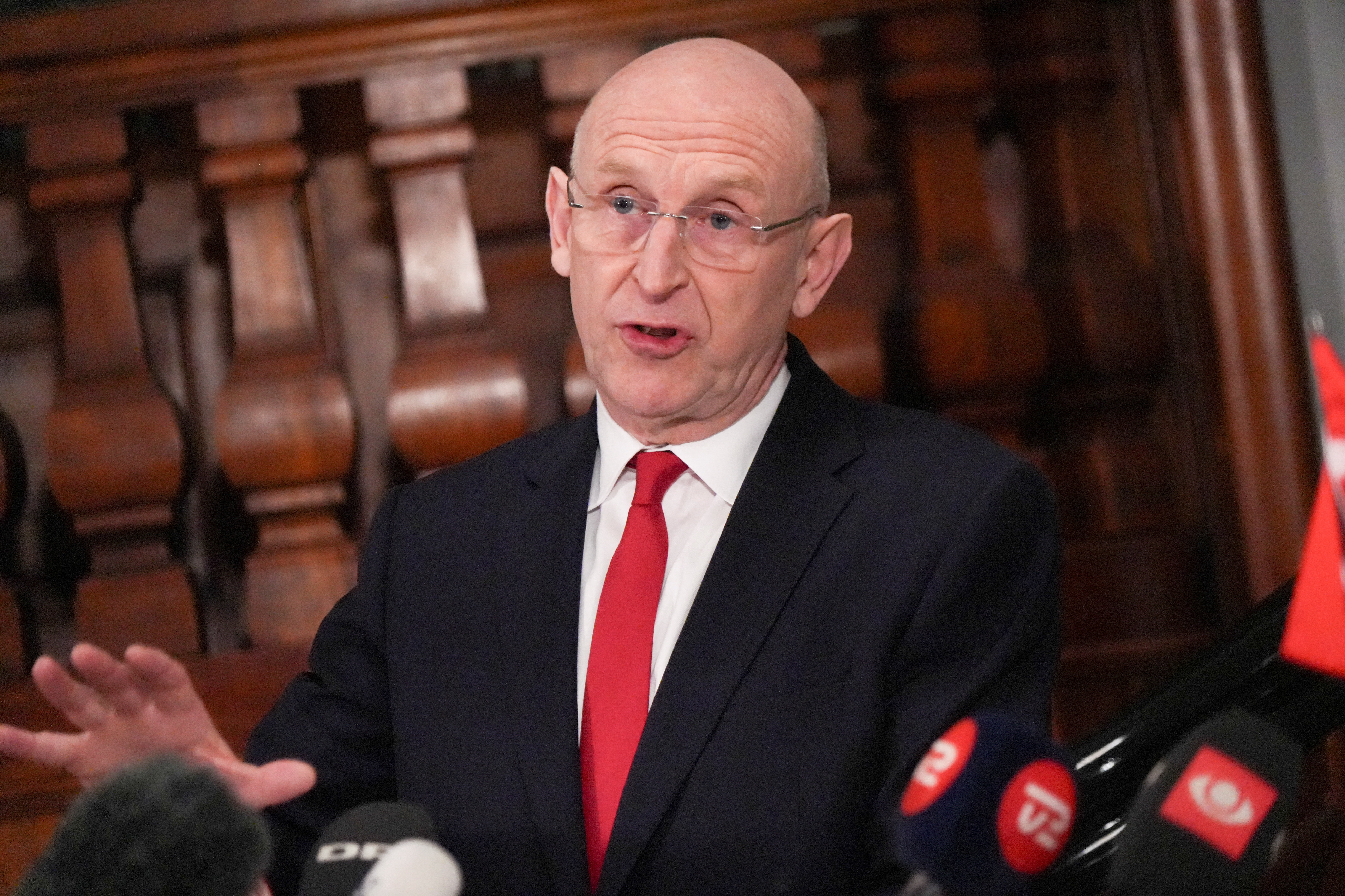 British Defence Secretary John Healey talks to the media in Copenhagen