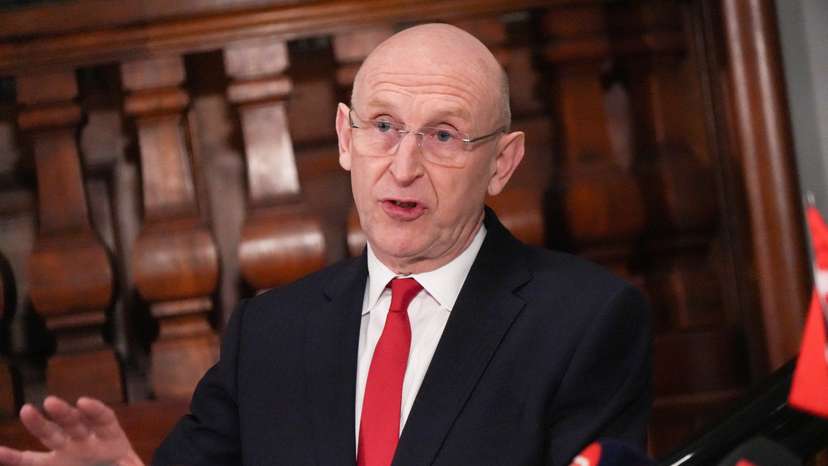 British Defence Secretary John Healey talks to the media in Copenhagen