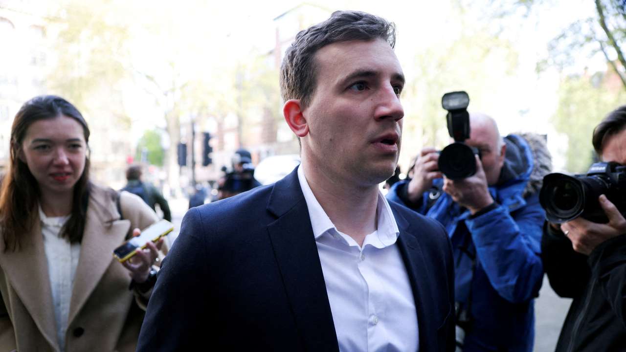 Christopher Cash, 29, who has been charged with spying for China, arrives at Westminster Magistrates' Court in London