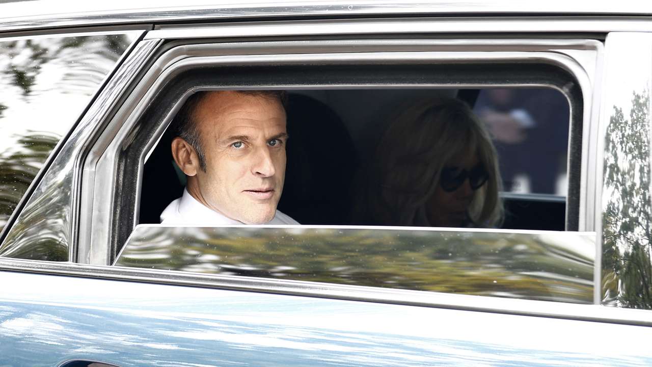French President Macron votes in the second round of French parliamentary elections