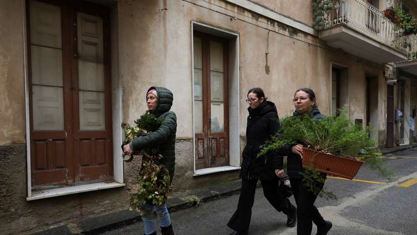 Residents scramble to remove belongings from homes in high-risk areas following a landslide in Niscemi