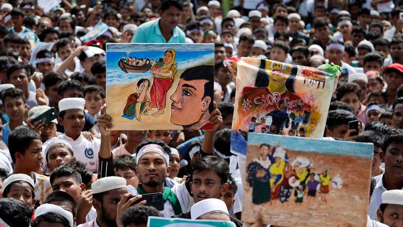 Rohingya refugees take part in a rally to mark the eight-year anniversary of their exodus, in Cox's Bazar