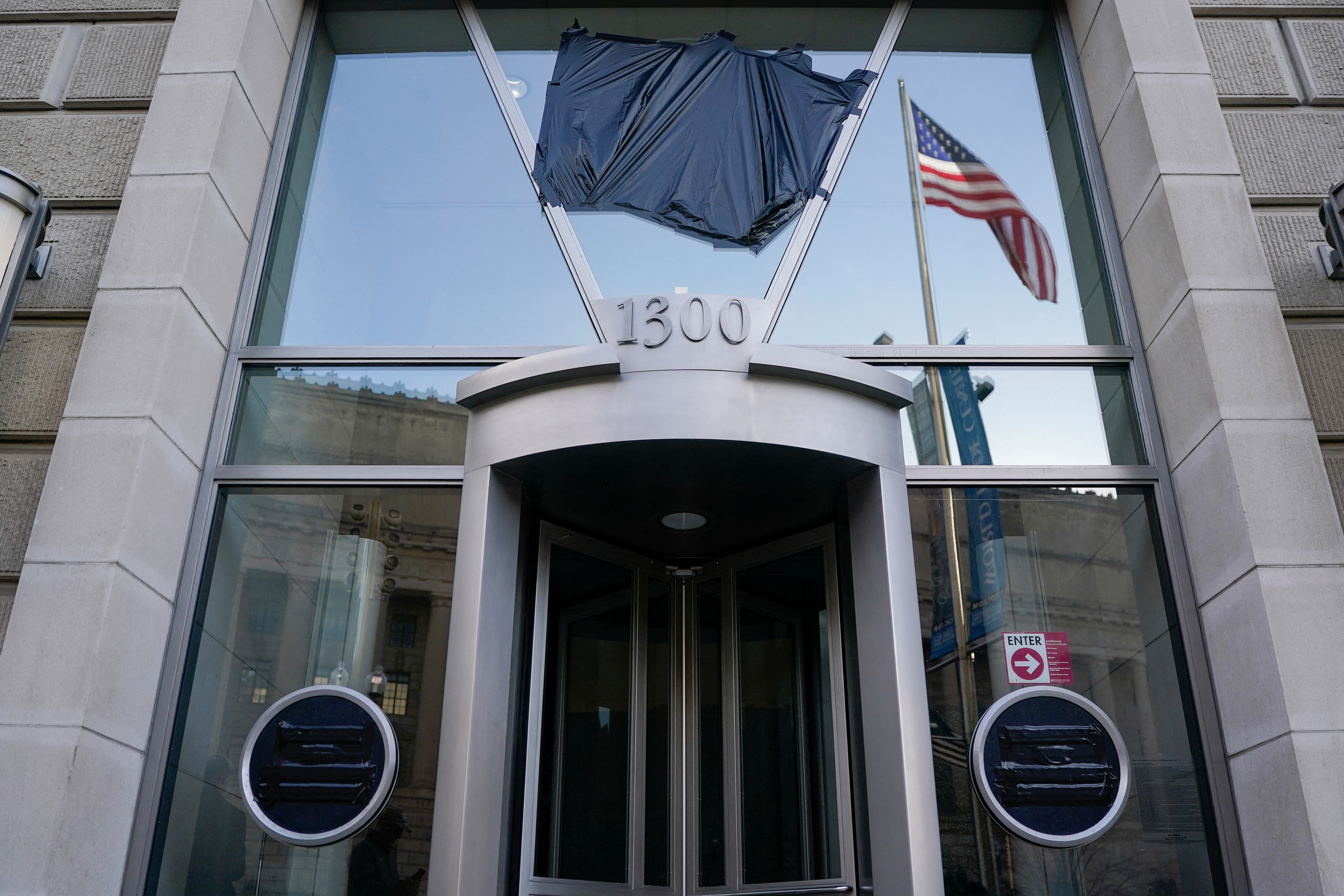 USAID signage is covered at the agency's headquarters in Washington