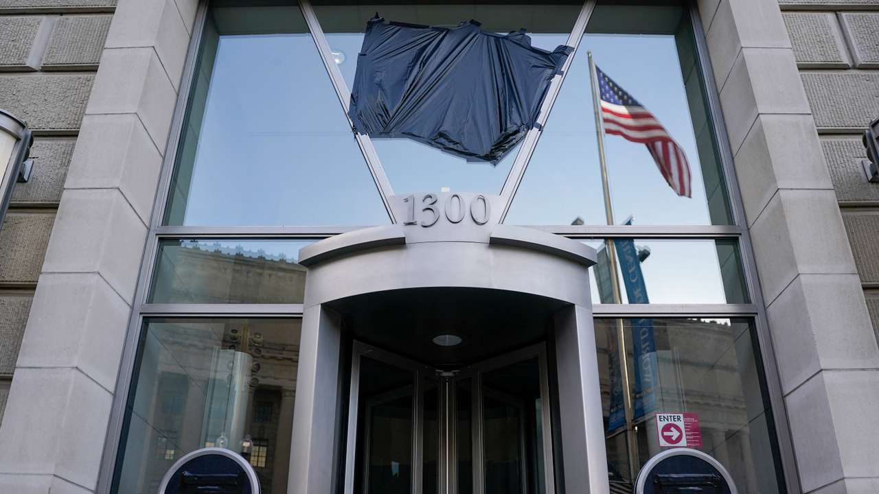 USAID signage is covered at the agency's headquarters in Washington