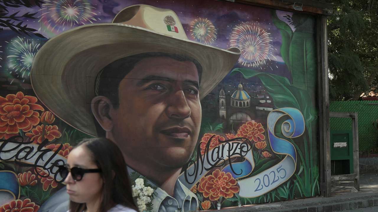 Protesters march to demand justice after the killing of Mayor Carlos Manzo, in Uruapan