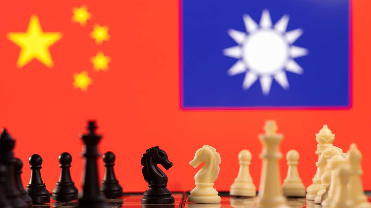Illustration shows China and Taiwan's flags