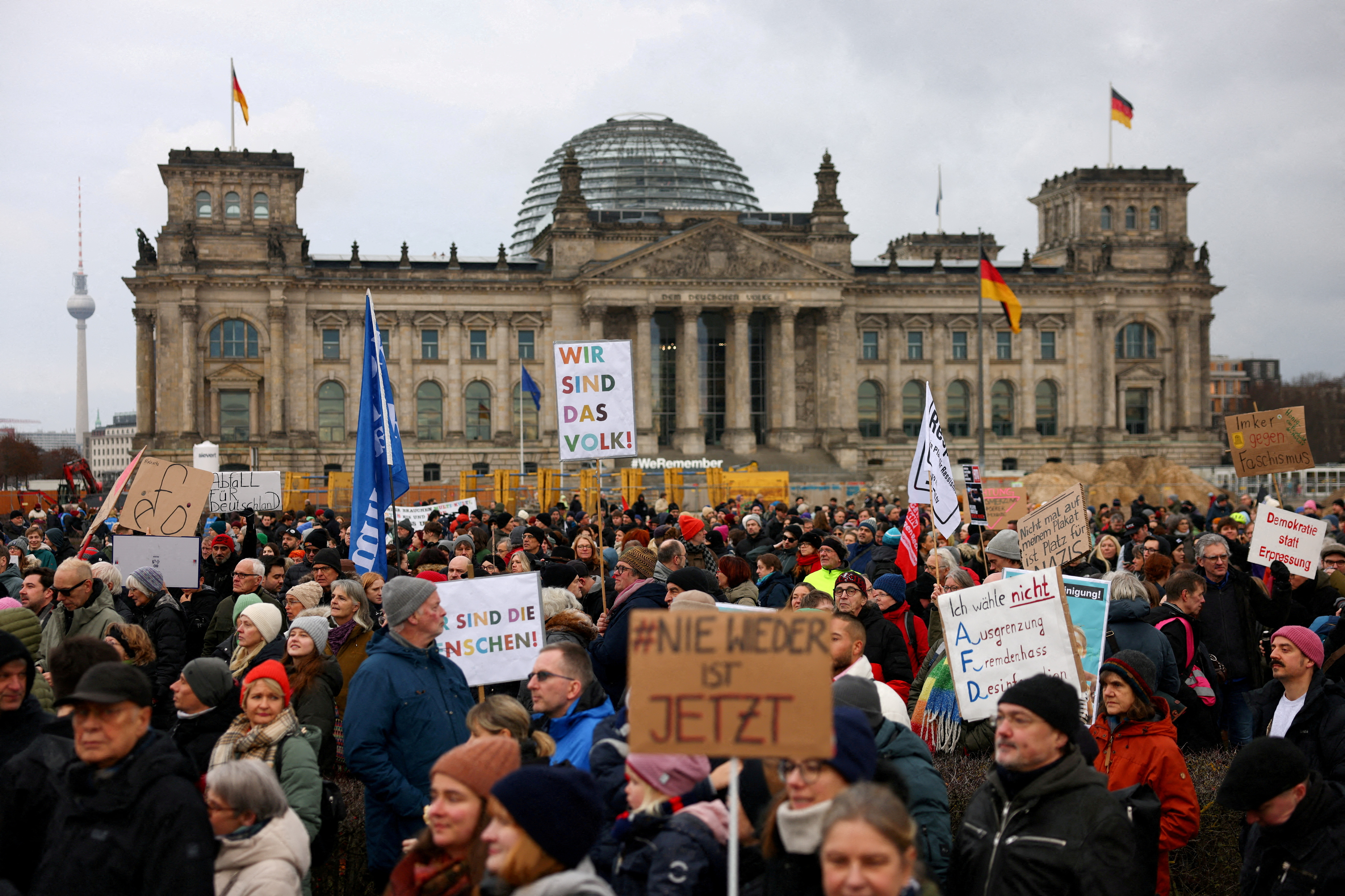 FILE PHOTO: Protest against chancellor candidate Merz's plans to limit migration, in Berlin
