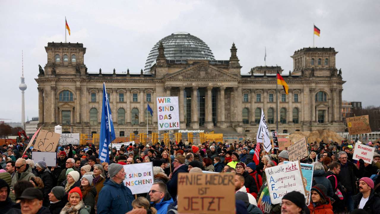 FILE PHOTO: Protest against chancellor candidate Merz's plans to limit migration, in Berlin