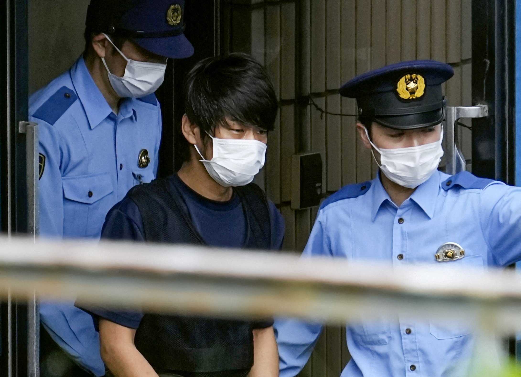 Tetsuya Yamagami, suspected of killing former Japanese premier Shinzo Abe, is taken to prosecutors in Nara, Japan