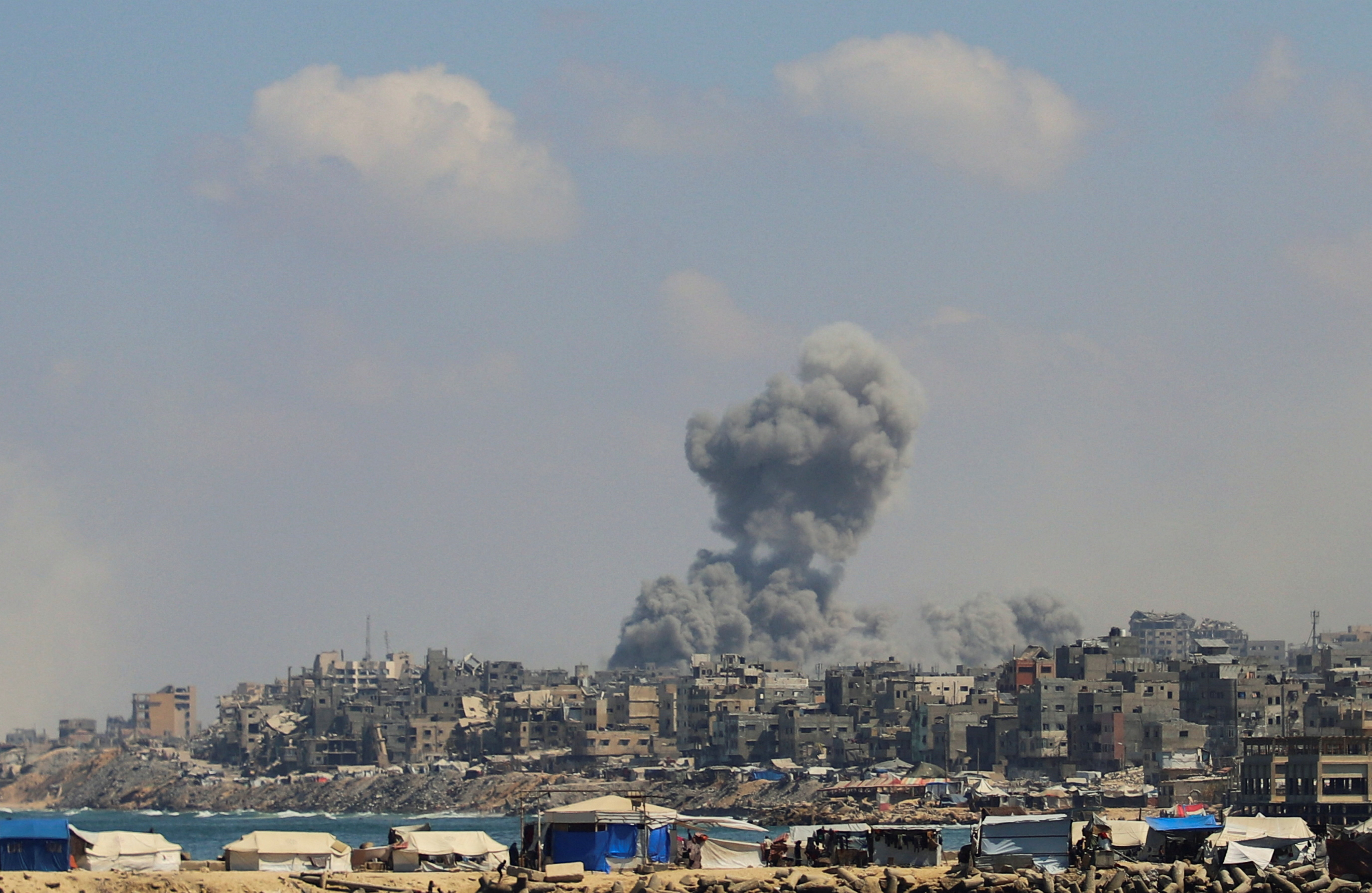 Smoke rises following Israeli strikes during a military operation, in Gaza City