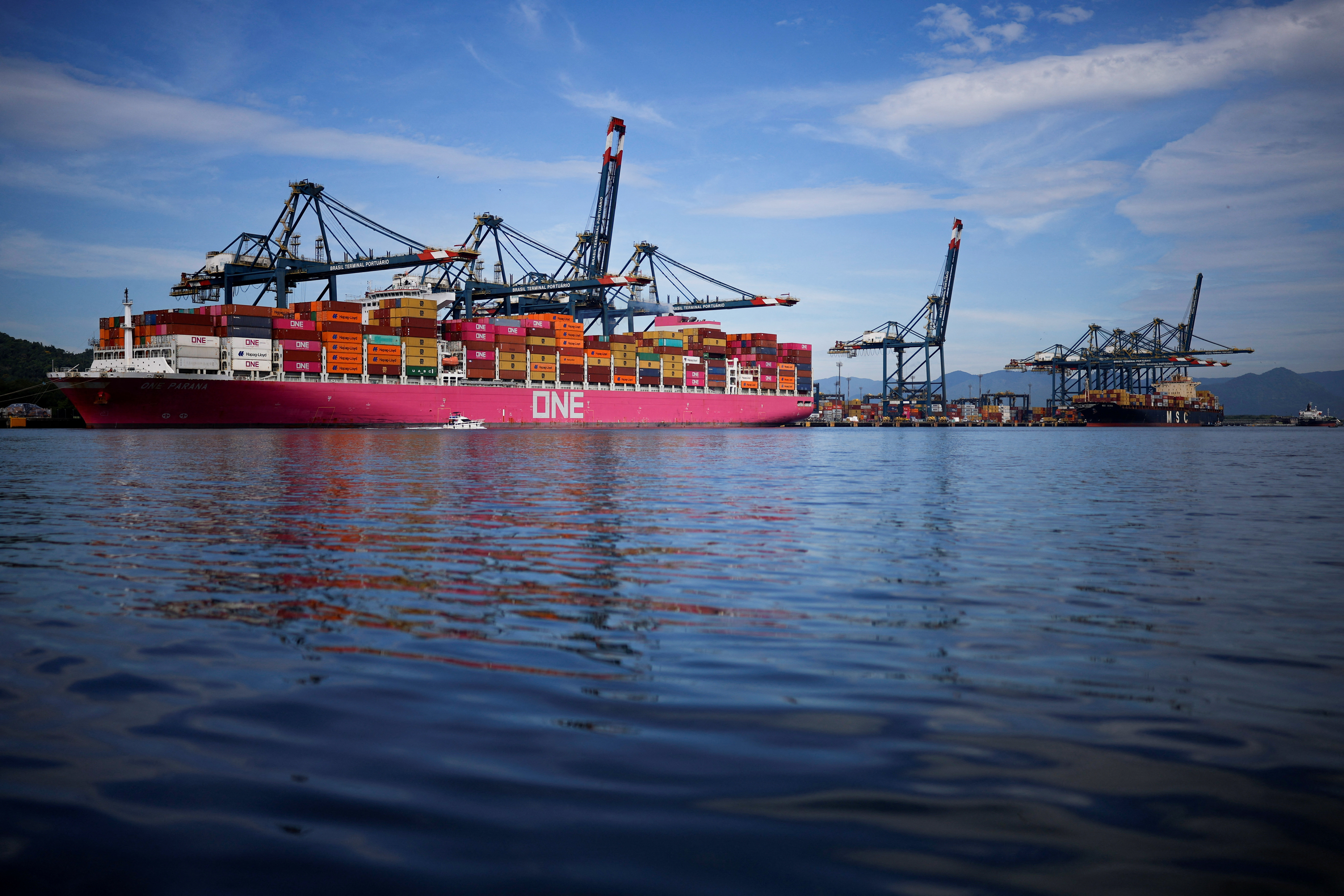 Ships and containers are seen at the Port of Santos, in Santos