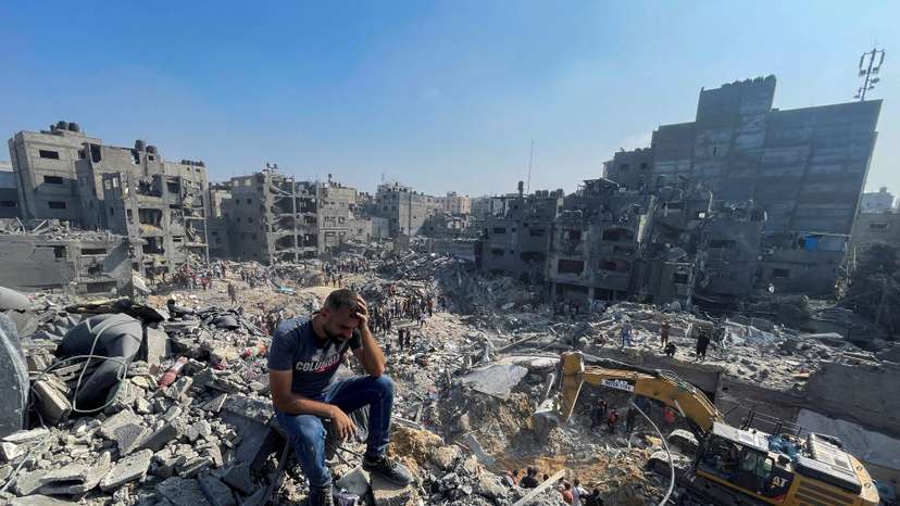 Palestinians search for casualties a day after Israeli strikes on houses in Jabalia refugee camp