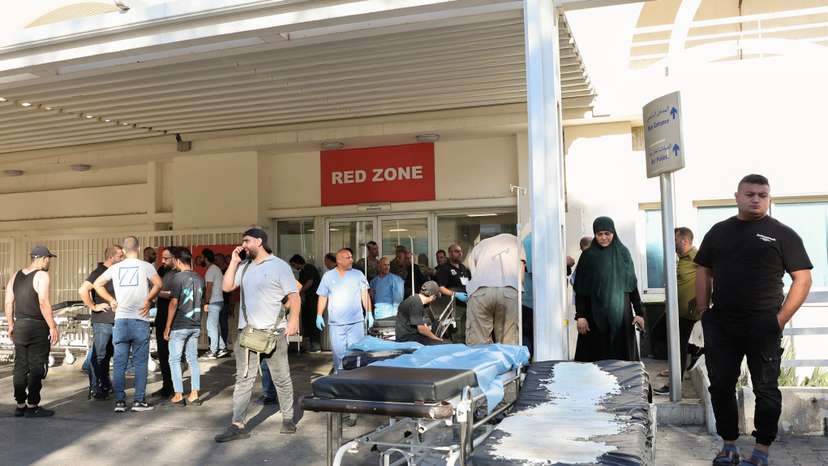 People gather outside a hospital, as hundreds of members of the Lebanese armed group Hezbollah, including fighters and medics, were seriously wounded on Tuesday when the pagers they use to communicate exploded, according to a security source, in Beirut