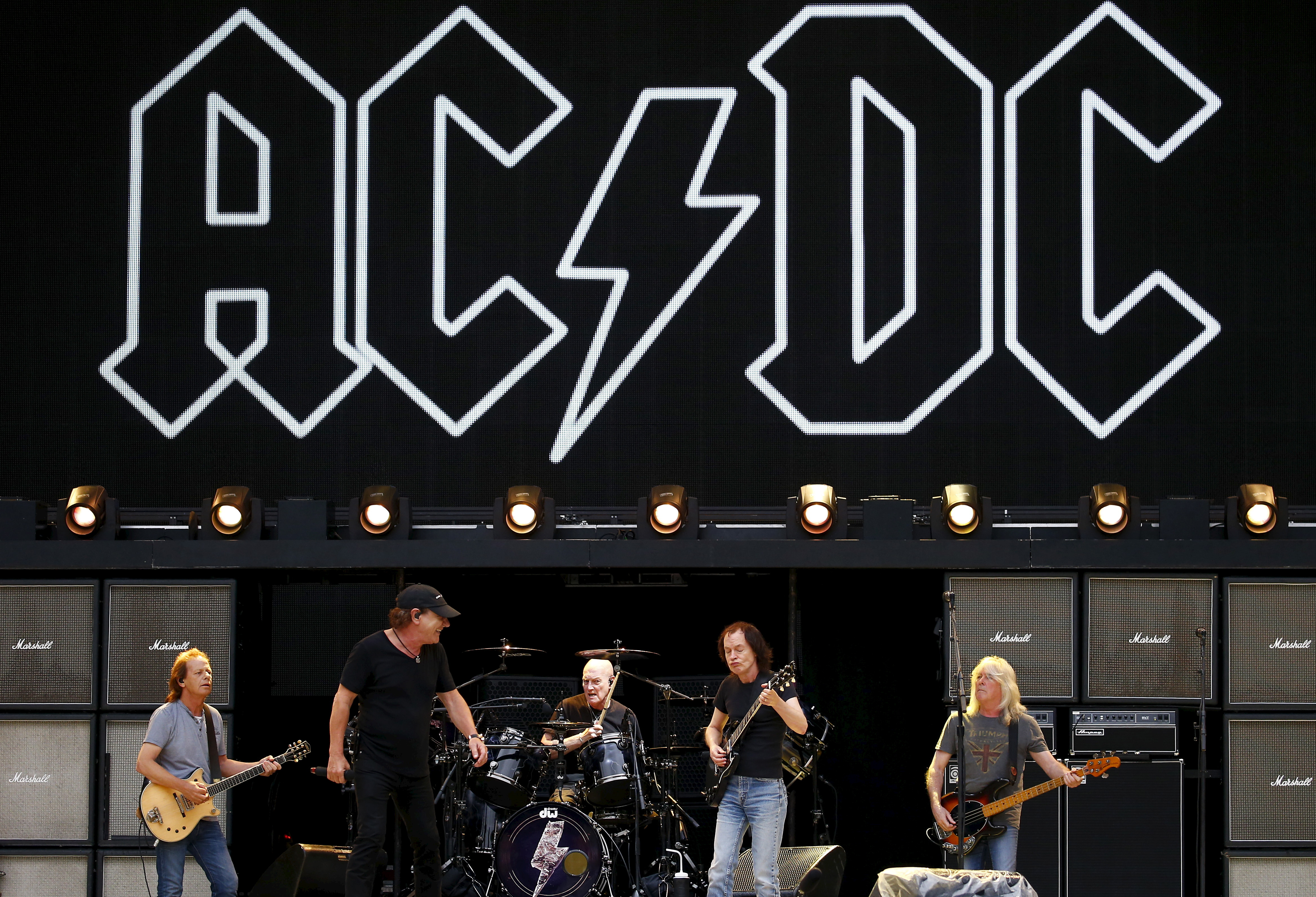 Members of the rock group AC/DC Stevie Young, Brian Johnson, Chris Slade, Angus Young and Cliff Williams perform during a rehearsal at Stadium Australia in Sydney, Australia