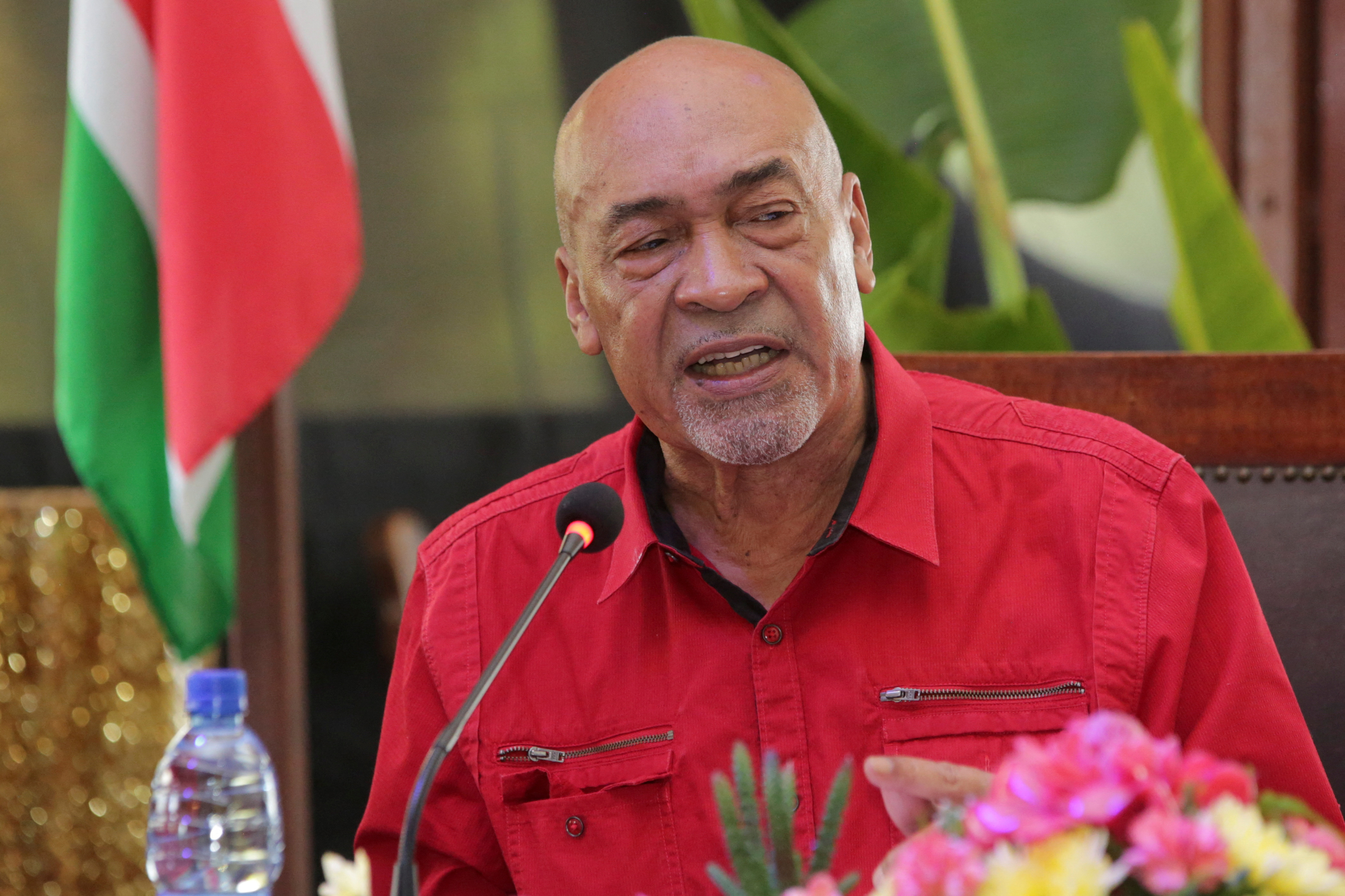 FILE PHOTO: Former Suriname president Desi Bouterse speaks during a news conference in Paramaribo