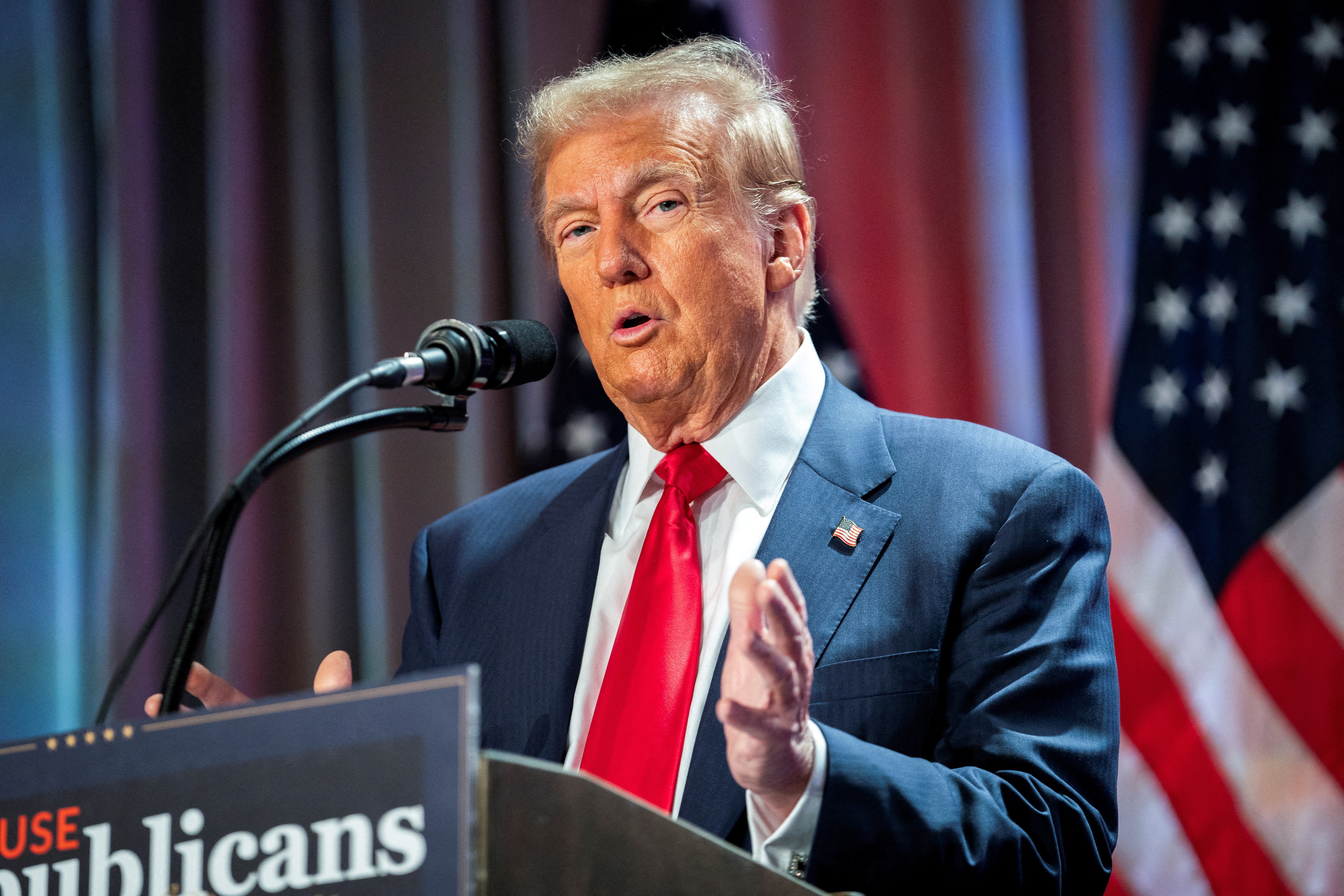 FILE PHOTO: US President-elect Donald Trump attends a meeting with House Republicans at the Hyatt Regency hotel in Washington