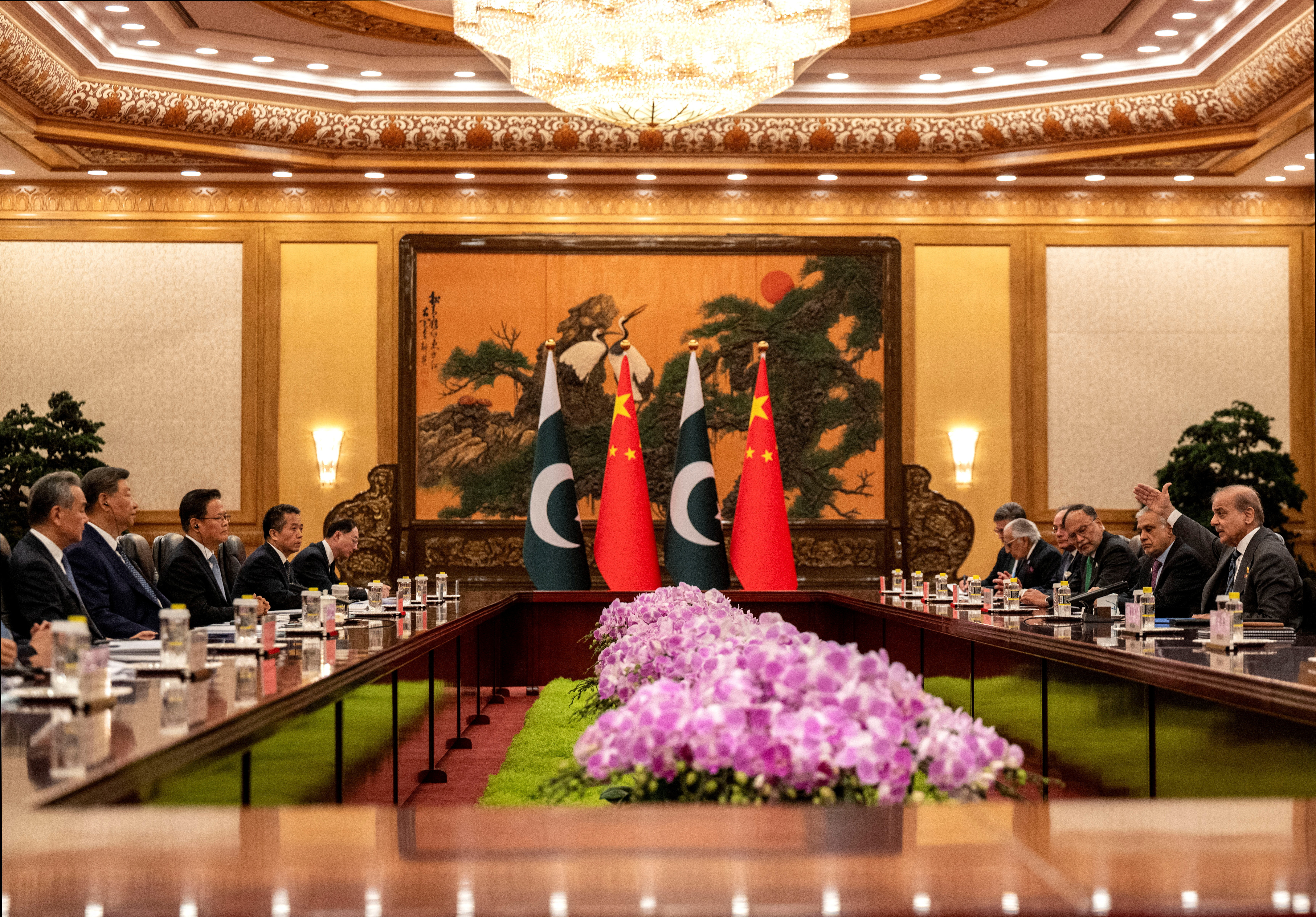 Pakistan Prime Minister Shehbaz Sharif gestures as he speaks at the beginning of a meeting with Chinese President Xi Jinping,in Beijing