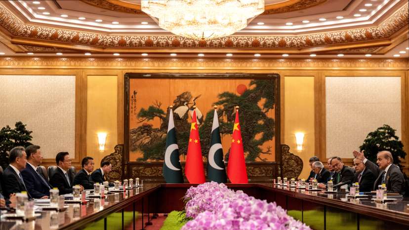 Pakistan Prime Minister Shehbaz Sharif gestures as he speaks at the beginning of a meeting with Chinese President Xi Jinping,in Beijing