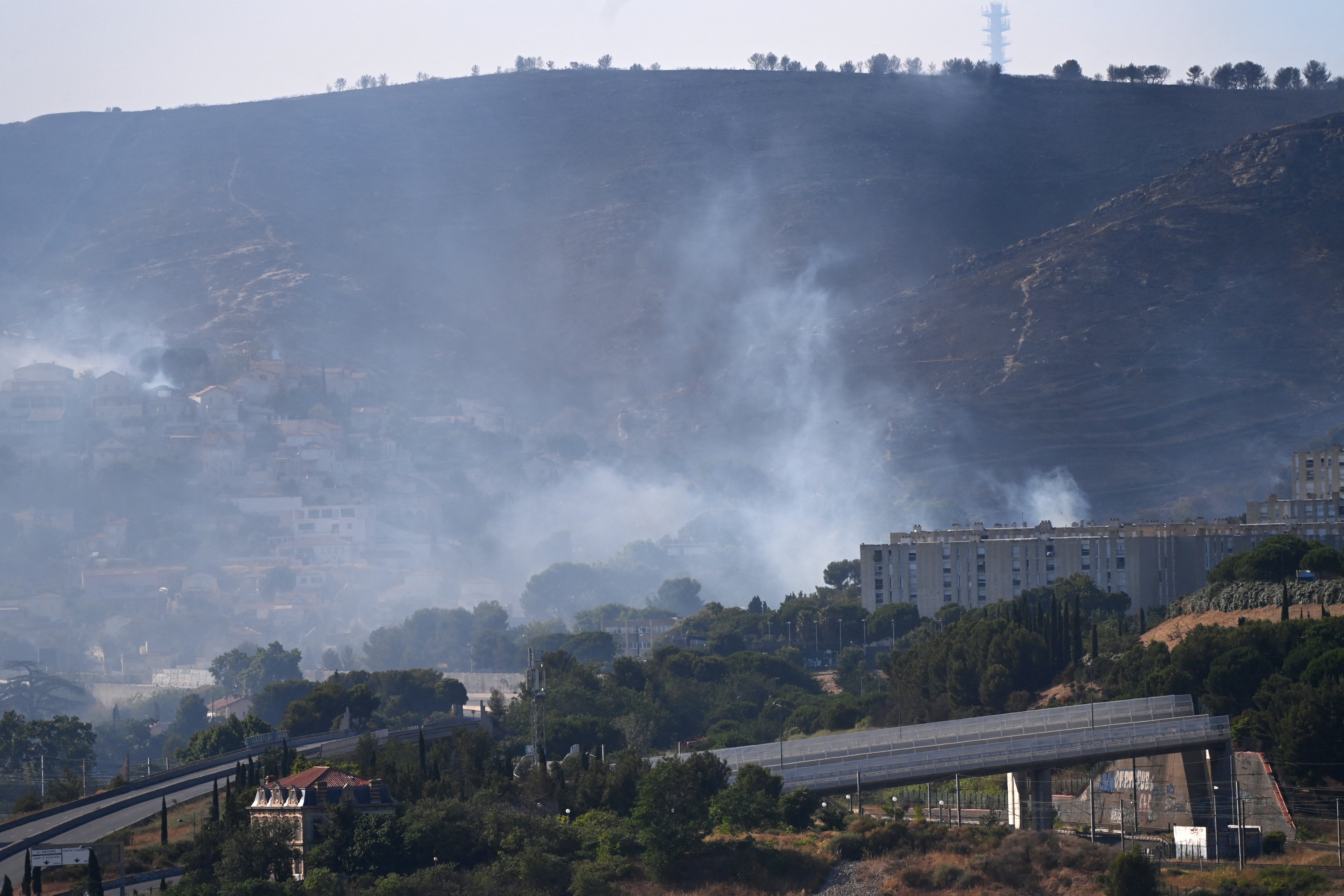 High winds fan wildfire in southern France near Marseille