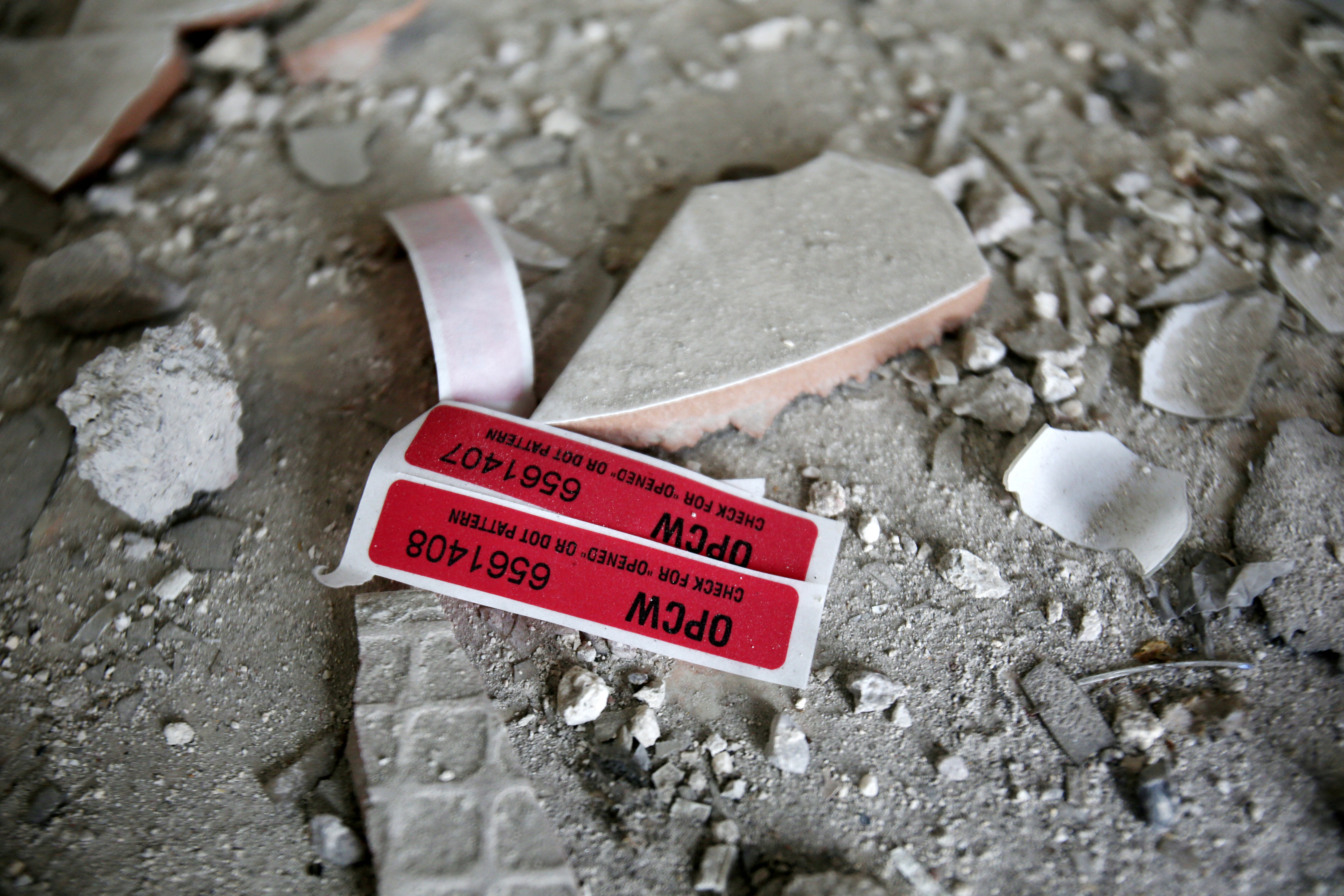 FILE PHOTO: Labels of the Organisation for the Prohibition of Chemical Weapons (OPCW) are seen iside a damaged house in Douma in Damascus