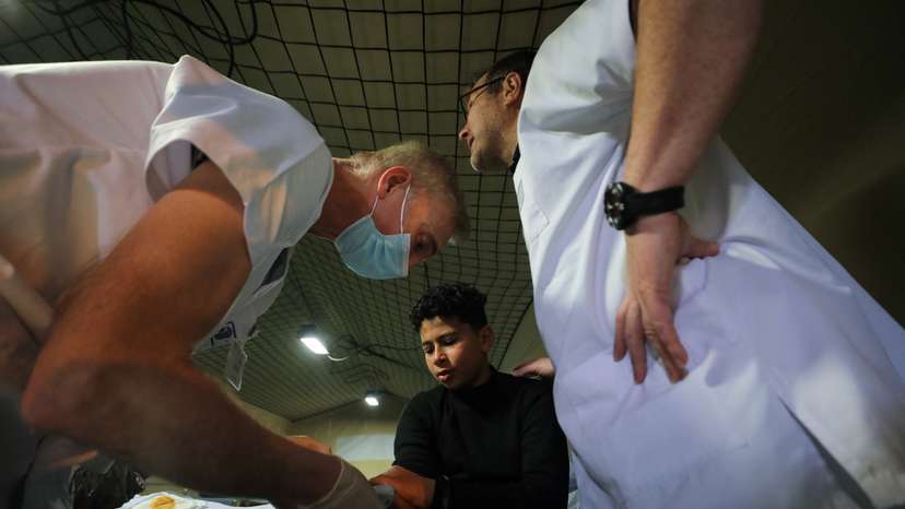 Wounded Palestinians at the hospital onboard the French ship amphibious helicopter carrier Dixmude, in Al-Arish