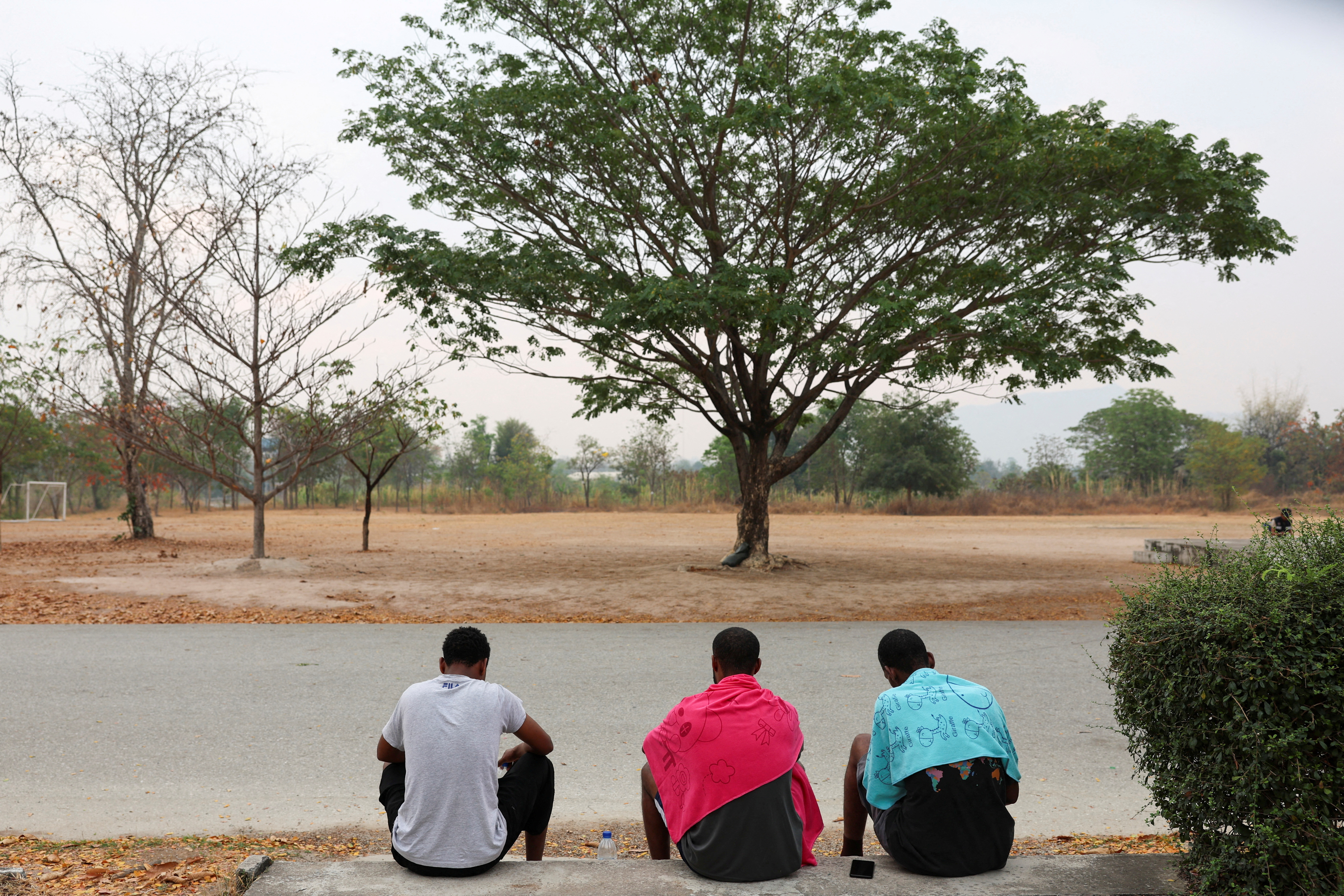 FILE PHOTO: Trafficked scam centre victims in Myanmar are sent to Thailand before repatriation, in Tak