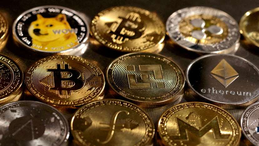 FILE PHOTO: Illustration shows representations of cryptocurrencies