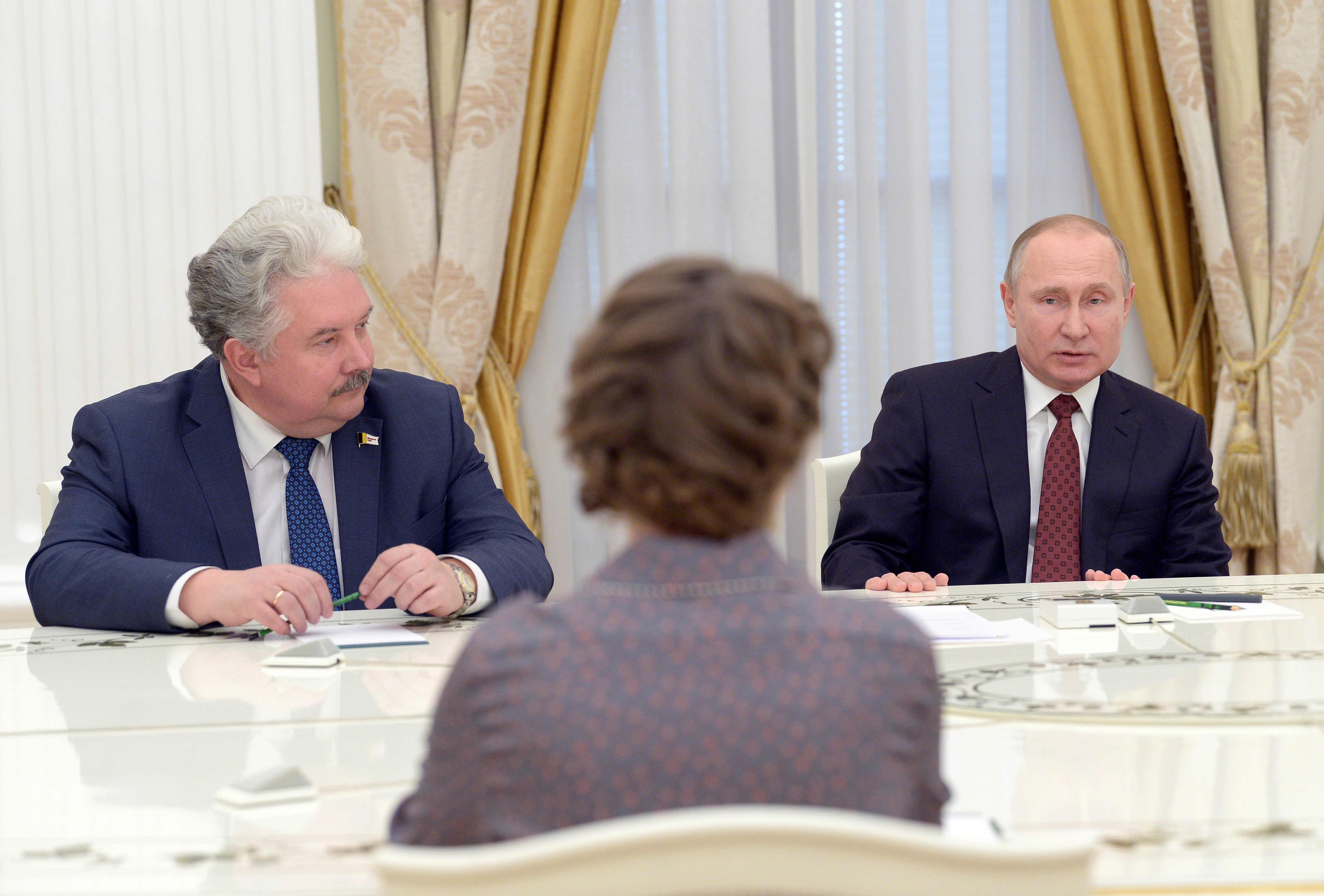 Russian President Putin meets with candidates who participated in the last presidential election, Sobchak and Baburin at the Kremlin in Moscow
