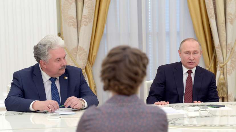 Russian President Putin meets with candidates who participated in the last presidential election, Sobchak and Baburin at the Kremlin in Moscow