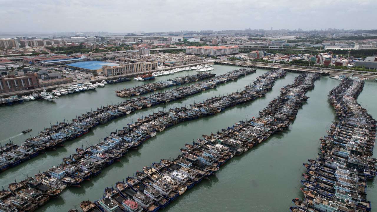 Fishing boats at a port as typhoon Doksuri approaches, in Xiamen