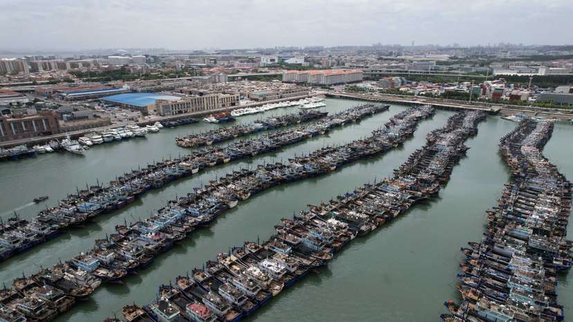 Fishing boats at a port as typhoon Doksuri approaches, in Xiamen