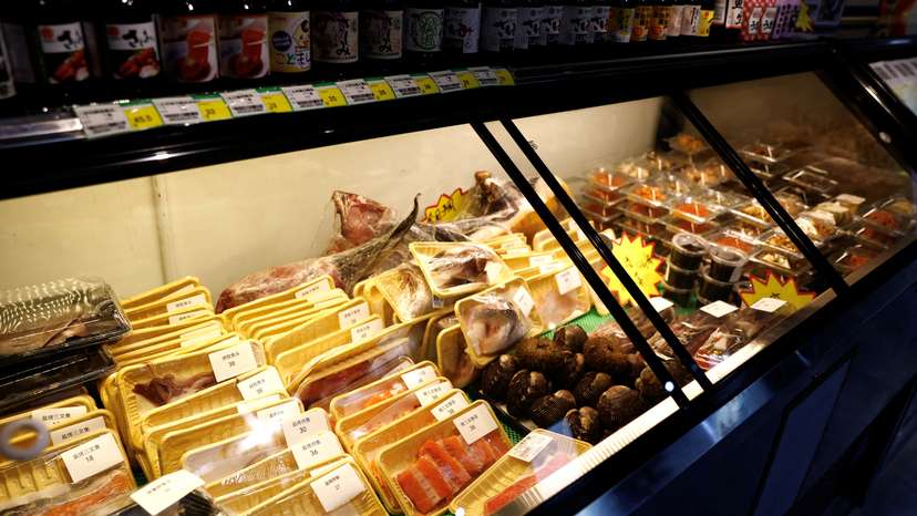 Packs of raw fish are pictured at a Japanese food store, in Beijing