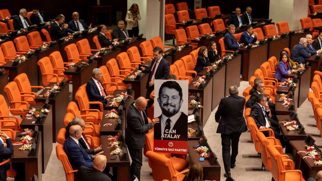 FILE PHOTO: Workers' Party of Turkey MPs display portrait of jailed Atalay in parliament in Ankara