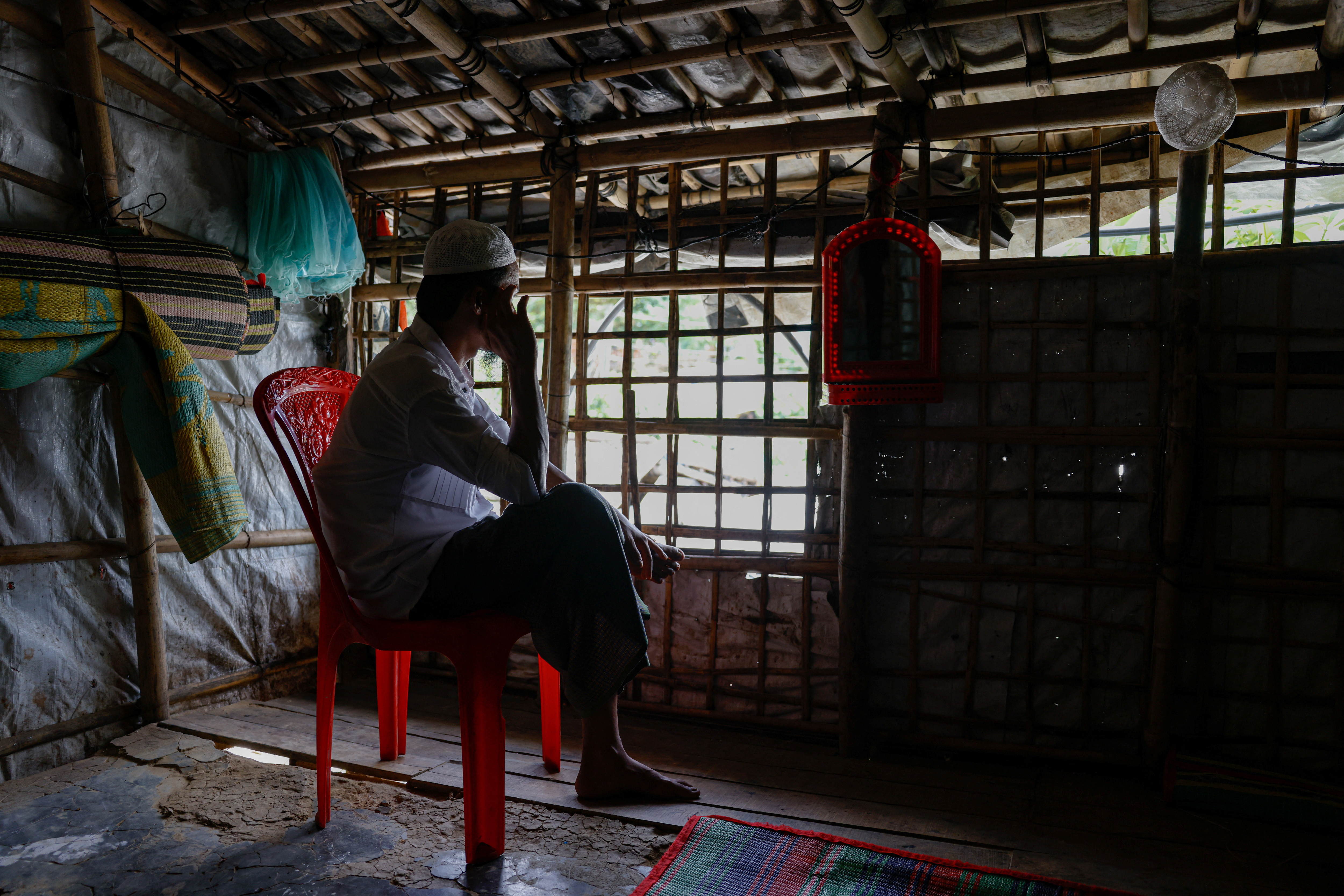 Rafiq, a Rohingya insurgent fighter poses for a picture during an interview with Reuters at a refugee camp, in Cox's Bazar