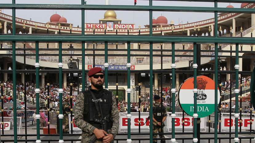 A Pakistan Rangers stands guard before the start of a parade at the Pakistan-India joint check post at Wagah border