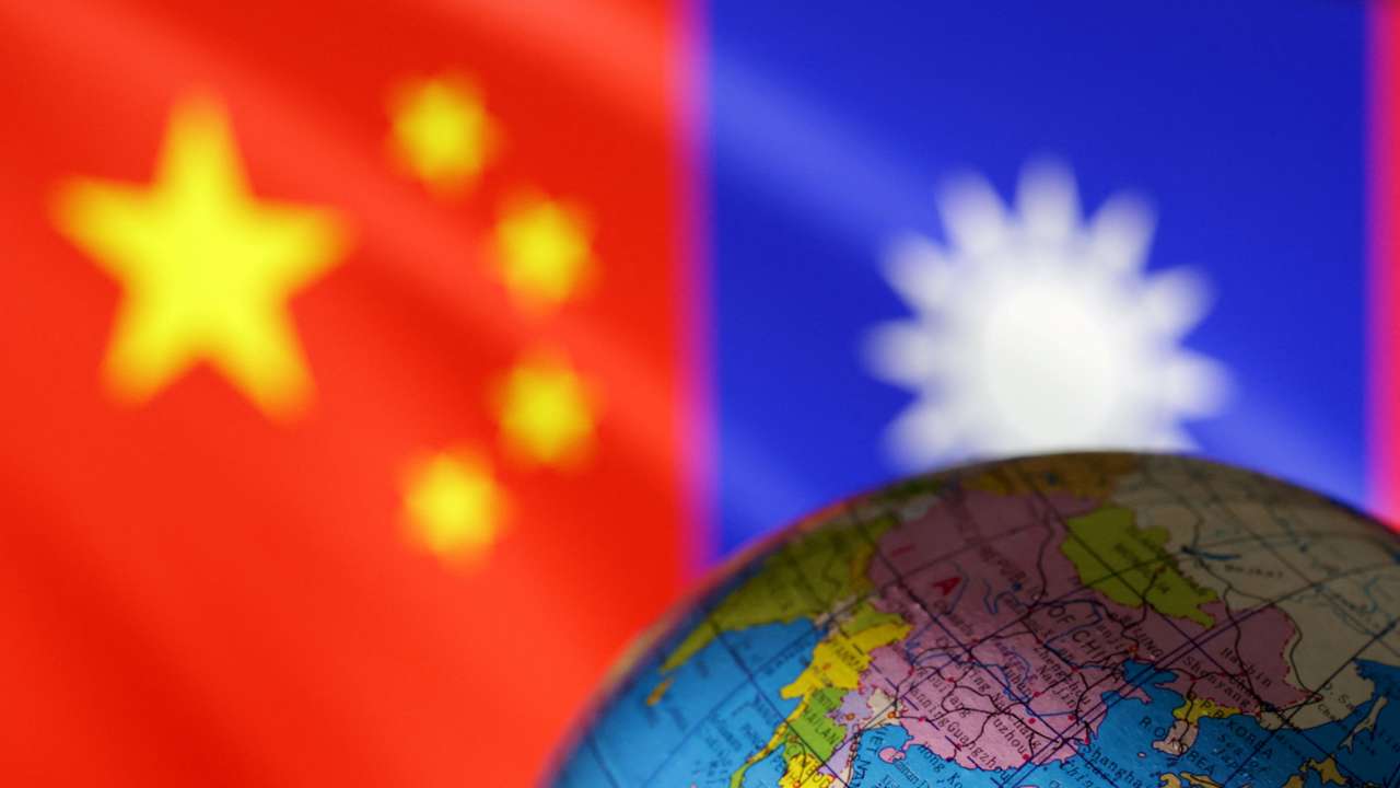 FILE PHOTO: Illustration shows Globe, Chinese and Taiwanese flags