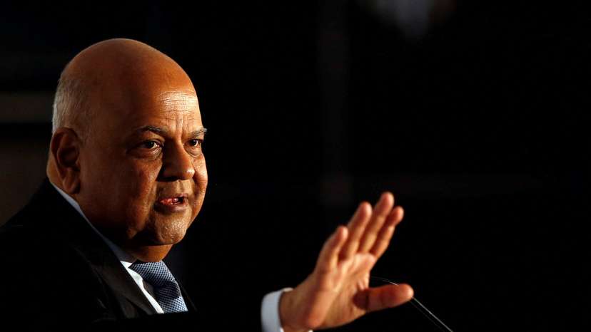 FILE PHOTO: Former Finance Minister Pravin Gordhan gestures during a business summit in Sandton