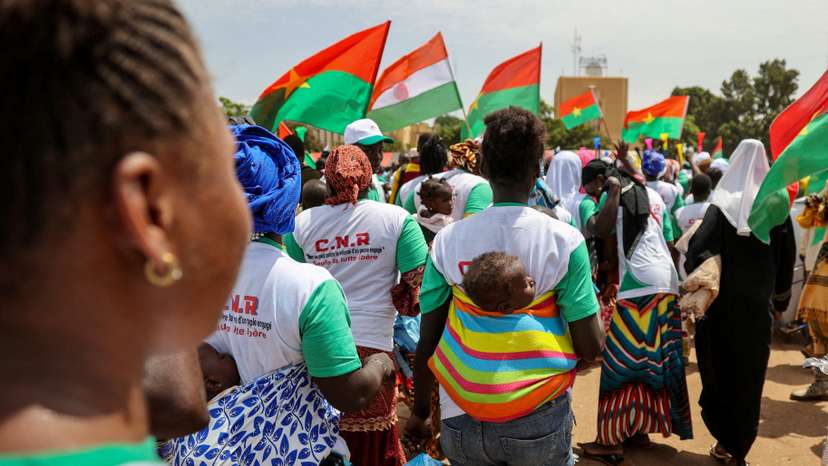 FILE PHOTO: Supporters of Burkina junta hold rally to mark one-year anniversary of coup, in Ouagadougou