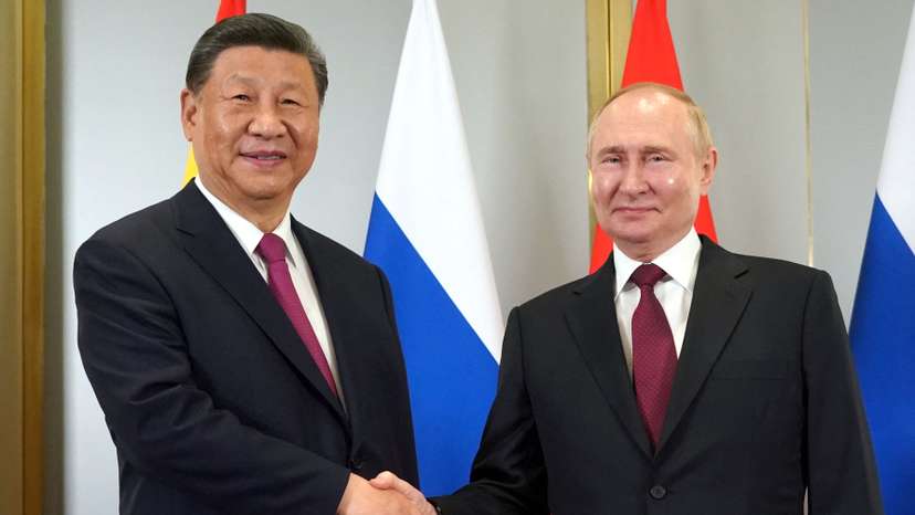 Russian President Putin and Chinese President Xi meet in Astana