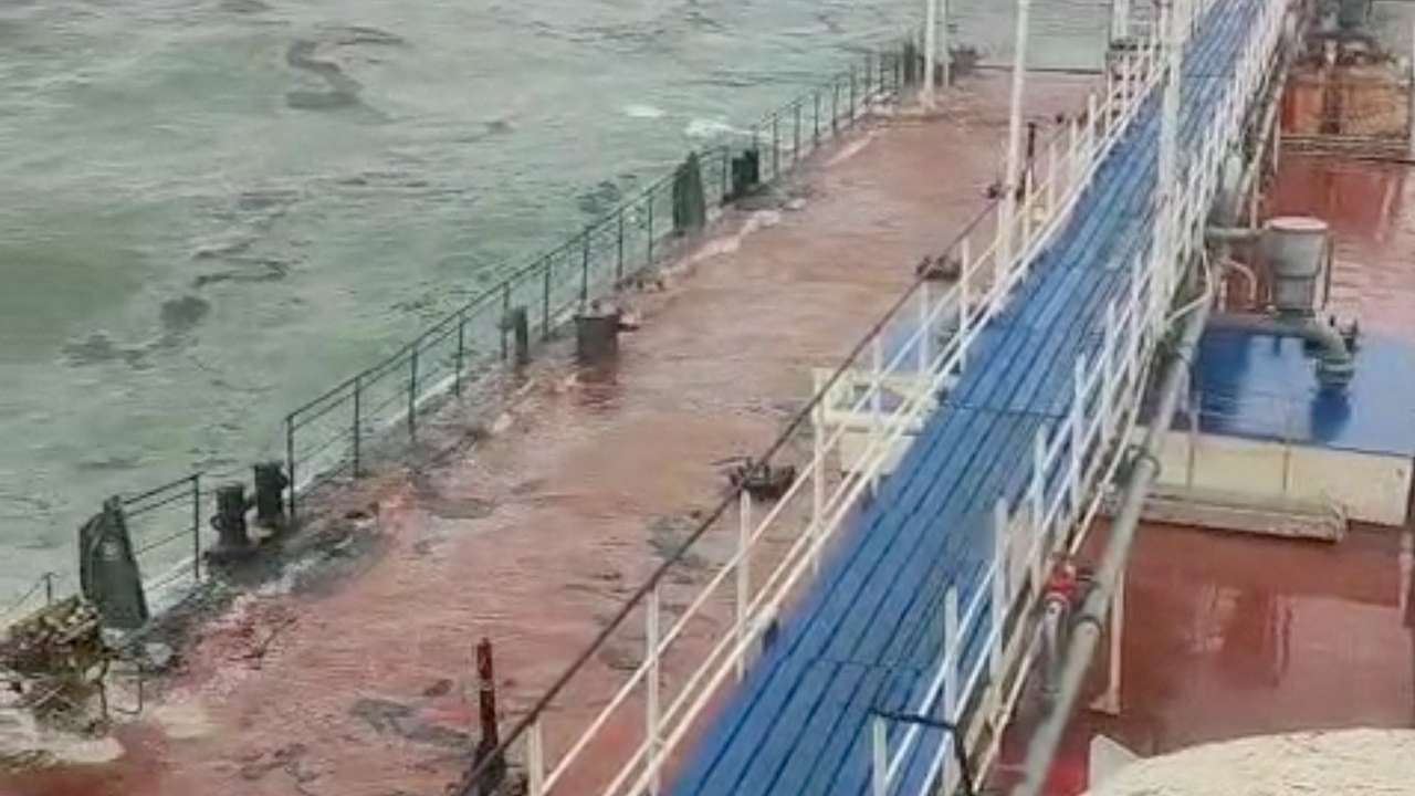 A view from the Volgoneft 239 oil tanker shows the sinking part of the vessel, whose damage caused an oil spill, in the Kerch Strait