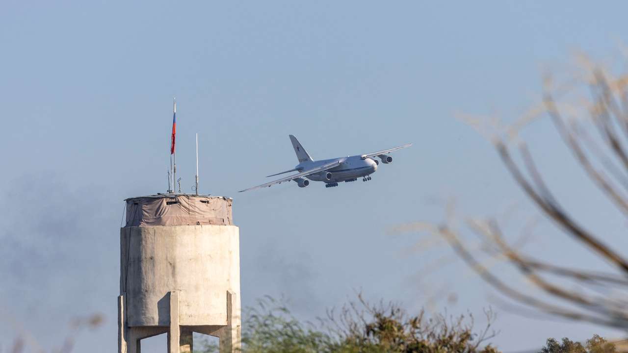 A Russian military aircraft approaches Hmeimim air base in Syria's coastal Latakia