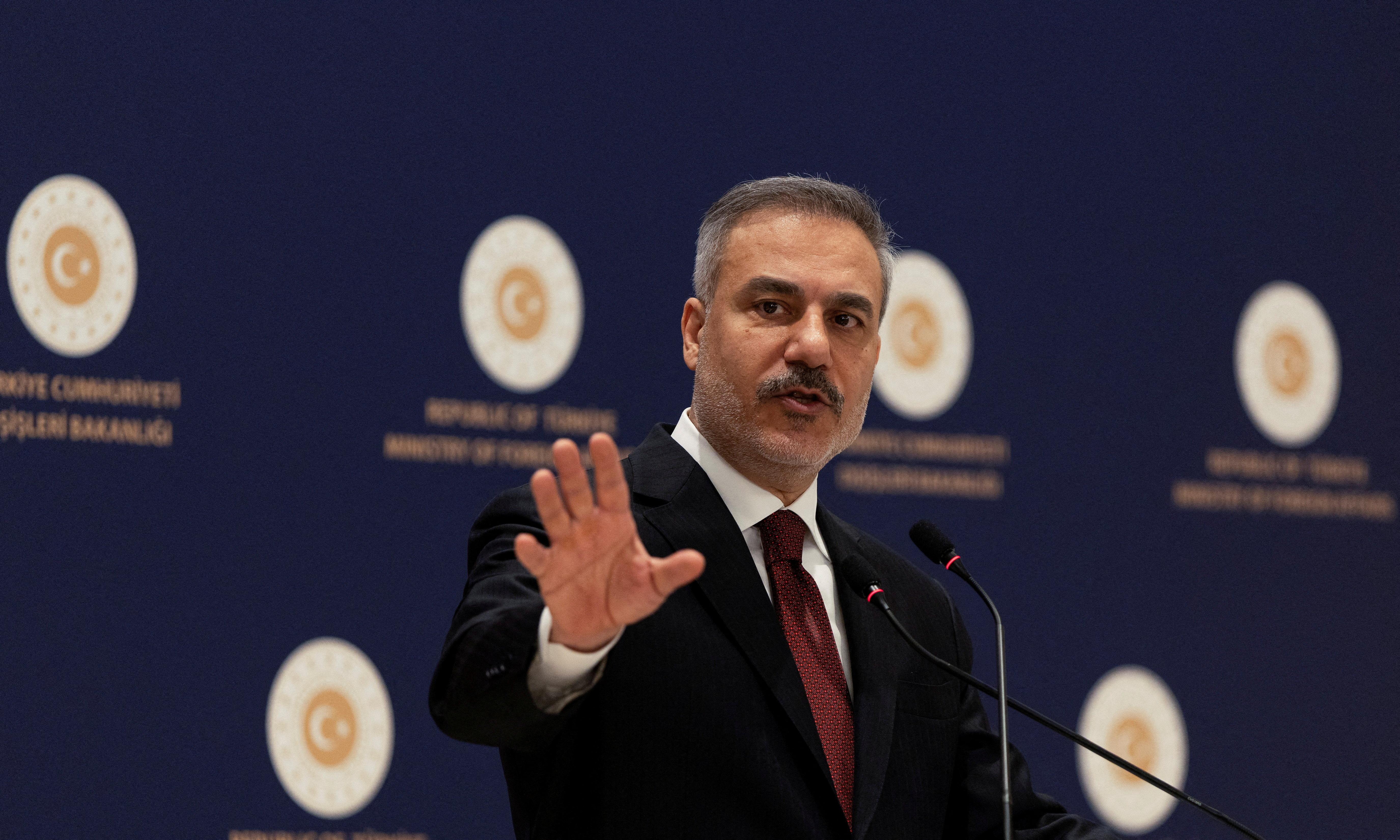 FILE PHOTO: Turkish Foreign Minister Hakan Fidan speaks during a press conference in Istanbul